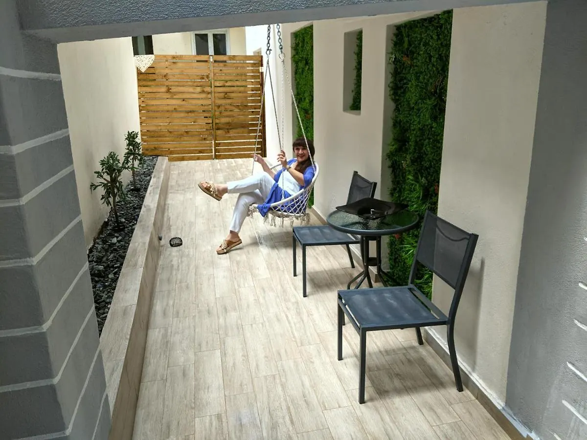 Cutest White-Tower Apartment With A Private Patio contacts